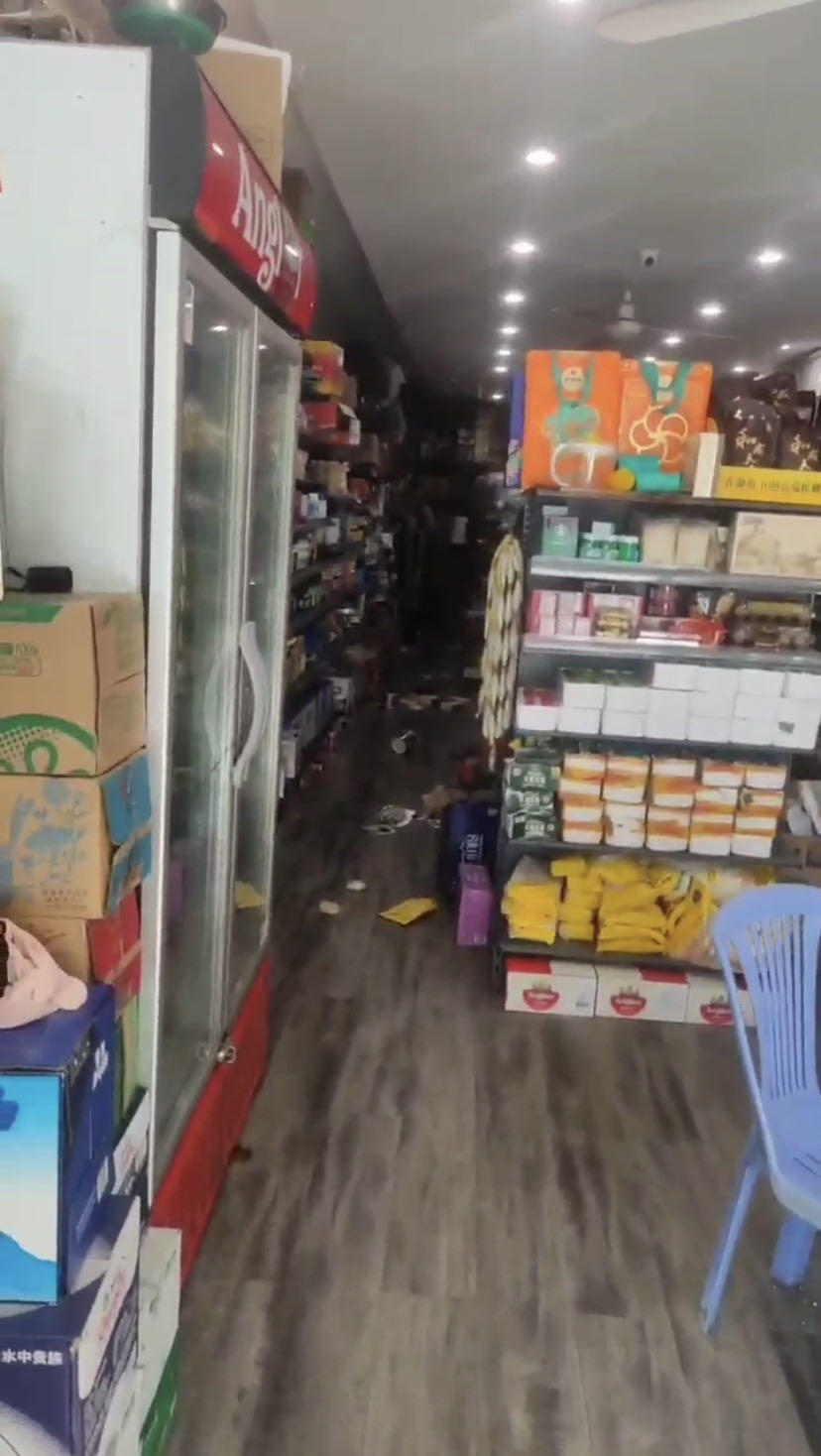 ▲胡春晓的朋友发现超市里货物洒落在地 受访者视频截图